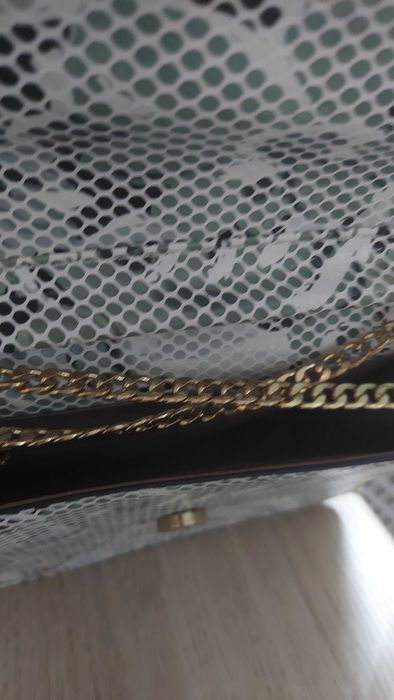 Жіноча сумочка..