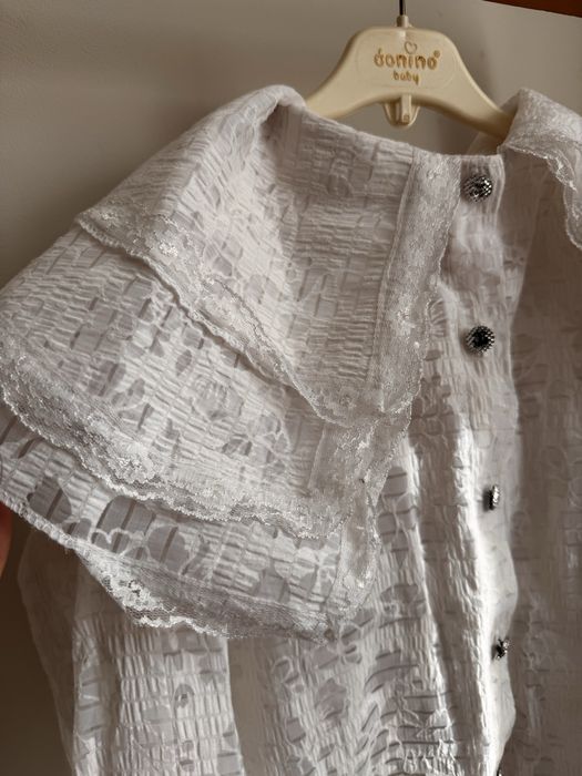 Біла блуза з мережива