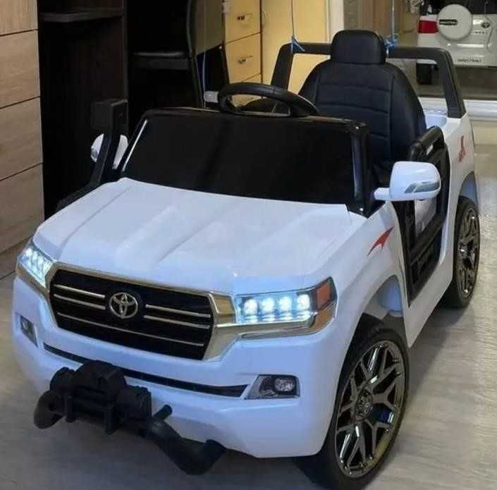 Дитячий електромобіль Тойота Крузак пульт музика світло детский EVA