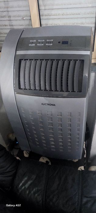 Ar condicionado impecável