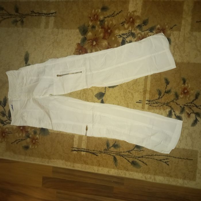 Нові білі брюки літні