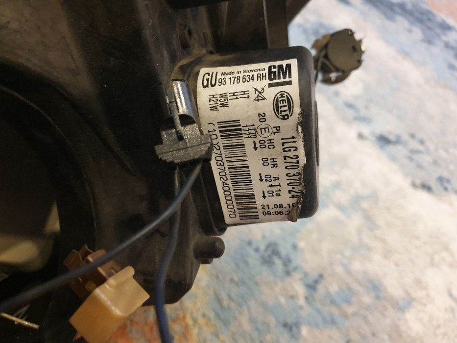 Faróis originais Opel Astra H