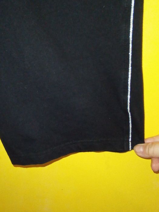 Czarne rybaczki ze srebrną wypustką , elastyczne 42/44