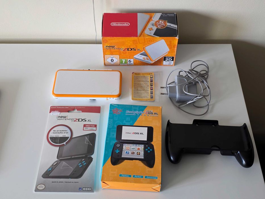 Konsola New Nintendo 2DS XL pomarańczowo - biała, zestaw