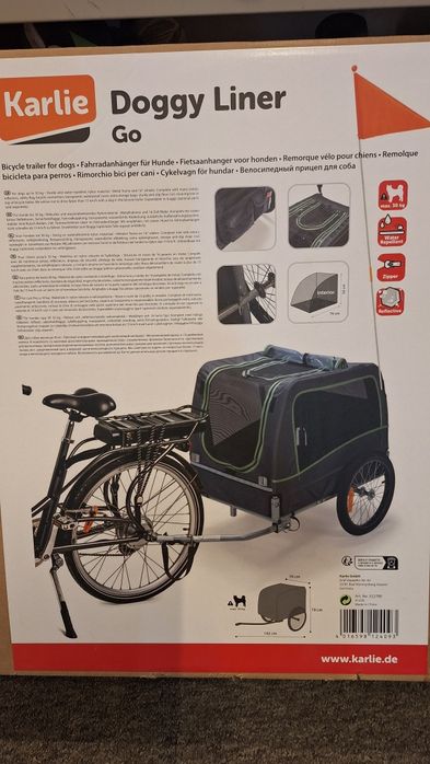 Sprzedam nowy wózek rowerowy dla zwierząt.