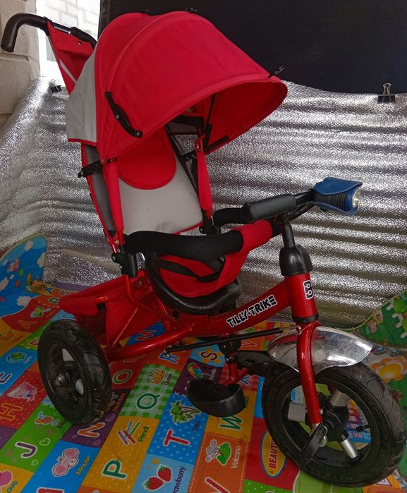 Продам детский музыкальный велосипед-коляска Lamber trike почти новый.