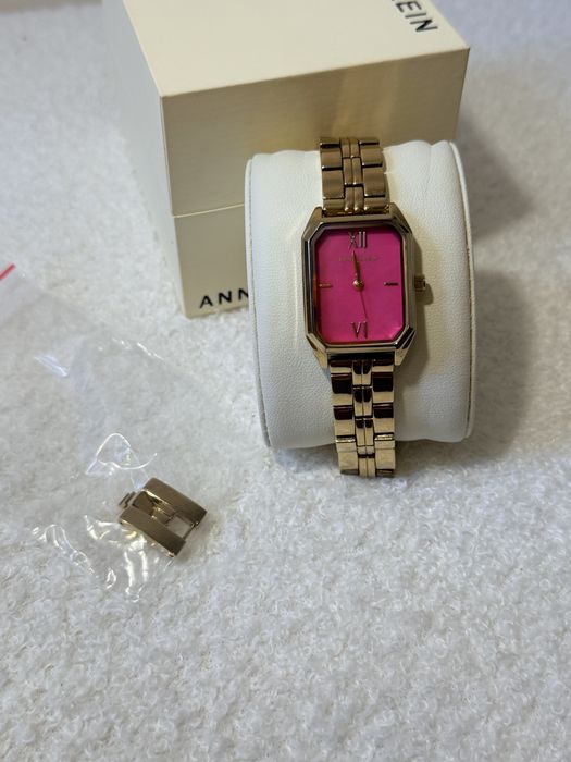 Anne Klein AK/3774HPGB — розкішний золотий годинник із рожевим циферблатом