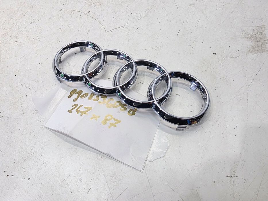 ZNACZEK EMBLEMAT Z GRILLA AUDI A3 A4 A5 TT 8J0853605B 247MM X 87MM