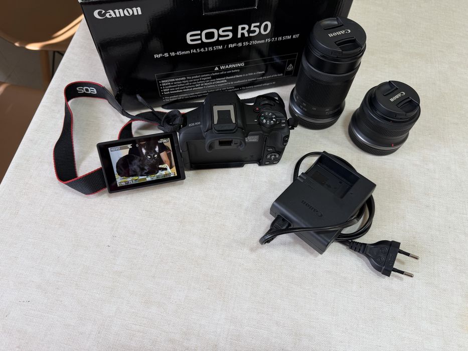 Canon R50 + objetiva 18-45mm + objetiva 55-210 + carregador