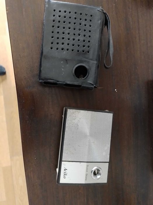 Radio Aciko com capa preta