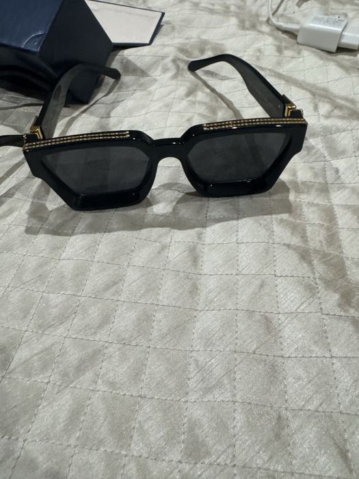 Óculos de Sol Louis Vuitton e Prada