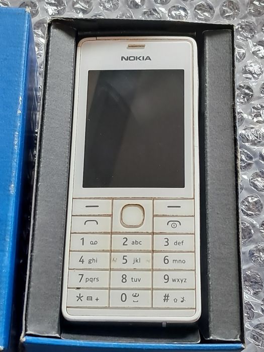 Biala Nokia 515 ladny stan pudelko ladowarka skuchawki kluczyk