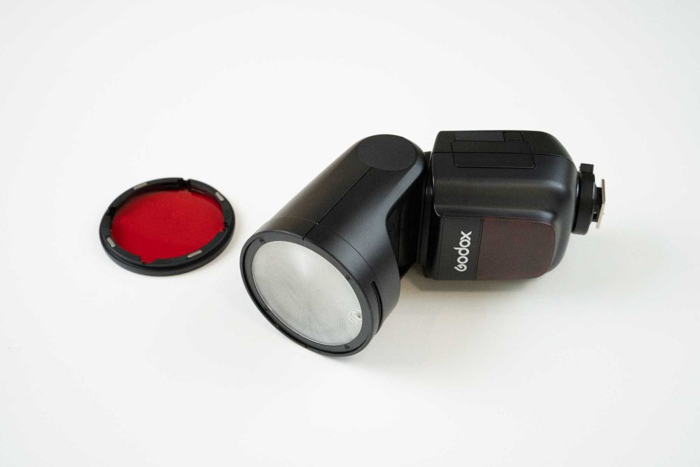 Flash Godox V1-N (para Nikon) - Cabeça Redonda com Bolsa e Acessório