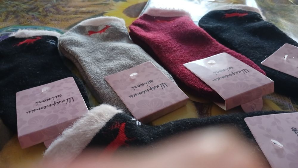 Продам новые теплые женские носки .