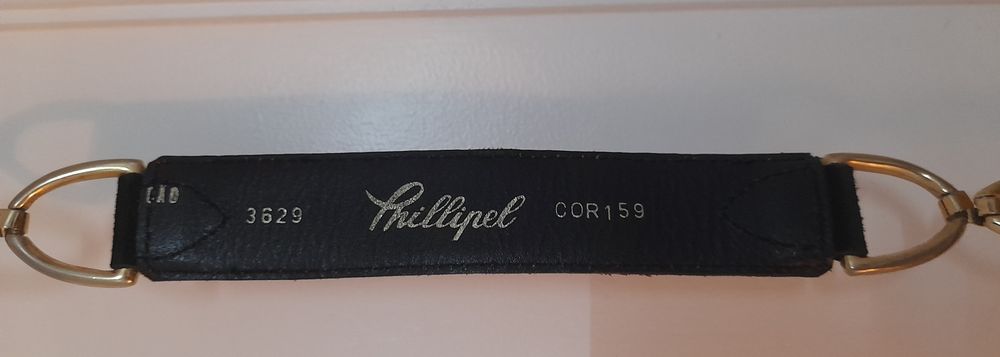 Cinto bordeaux em camurça forrado a pele preta com dourados