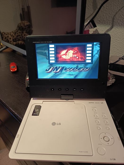 DVD portátil para venda a funcionar com os acessórios e mala LG