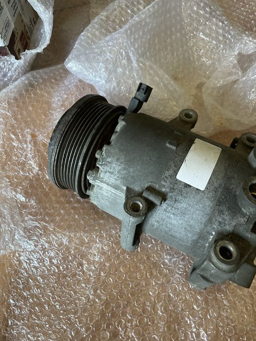 Компресор кондиціонера Форд Ford 19D629-BB