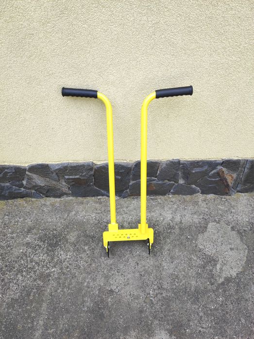 Екстрактор, захват для демонтажу тротуарної плитки, бруківки