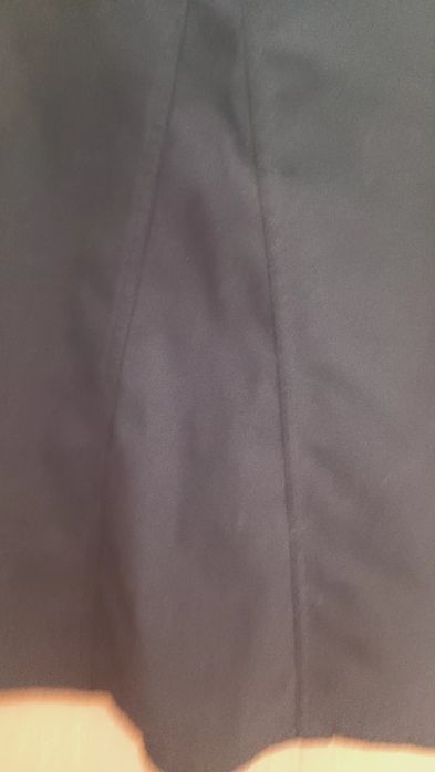 Saia preta com bolsos