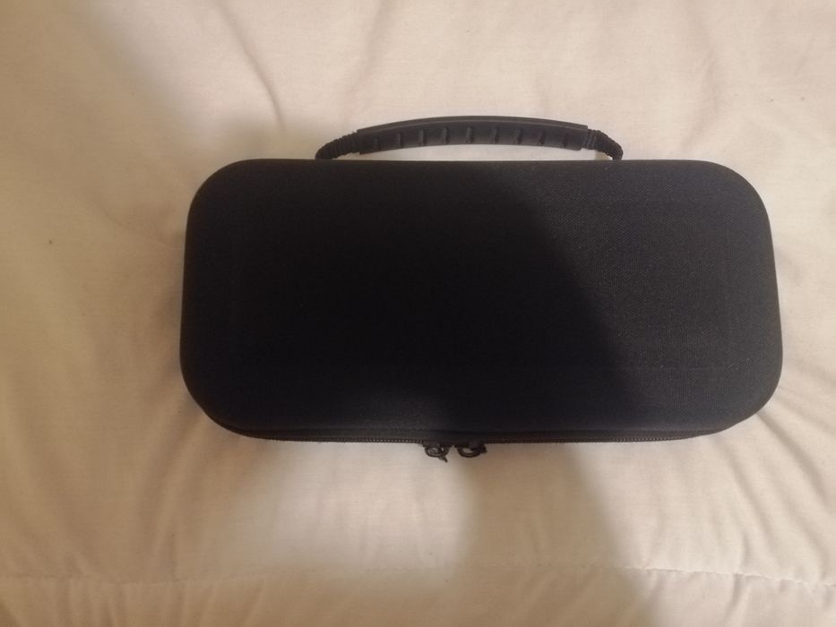 Nintendo Switch with Two Games, Charger, and Carrying Case64738628946051124