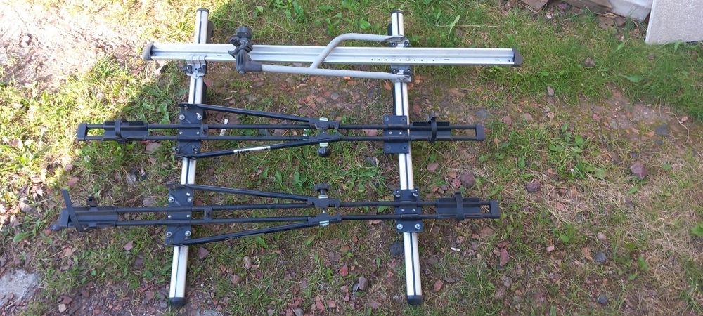 Bagażnik na rowery na dach belka reling Thule 566 zamykany na klucz