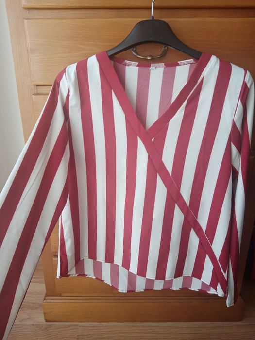 Blusa as risca como nova