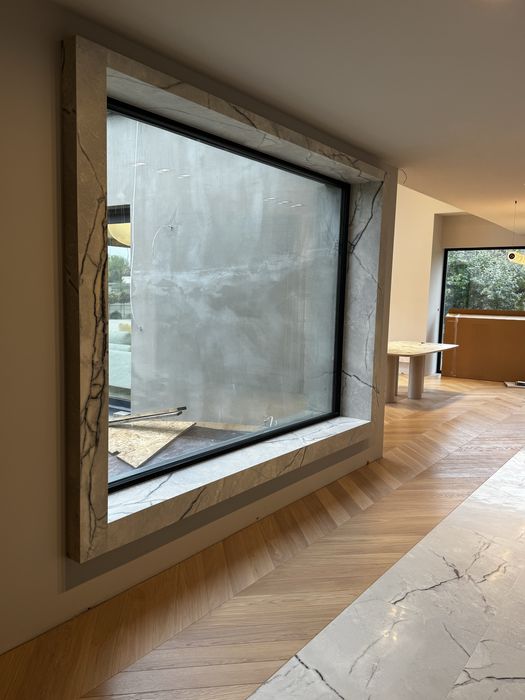 Łazienki, układanie płytek, kamienia, parapety, kominki.