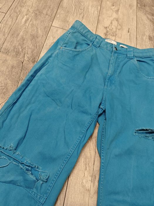 Spodnie jeansowe niebieskie Bershka balloon L 100 % bawełna z dziurami