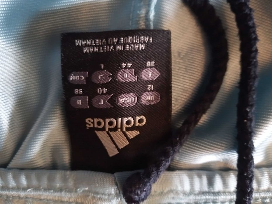 Calças Adidas azul claro julgo que unisexo