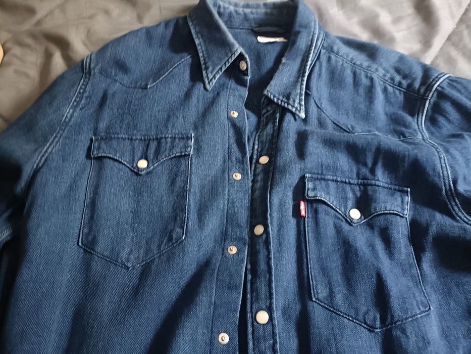 Selling blue denim shirt by Levi's.