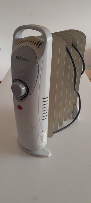Mini aquecedor óleo