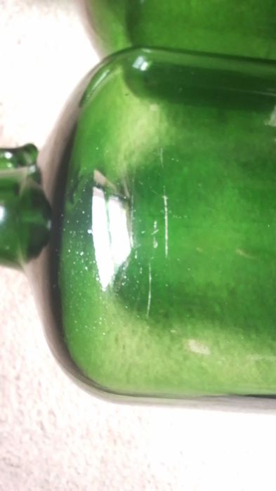 Garrafões de vidro com asa