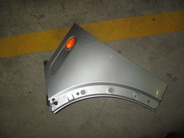 Guarda-lamas esquerdo MINI Mini (R50, R53)