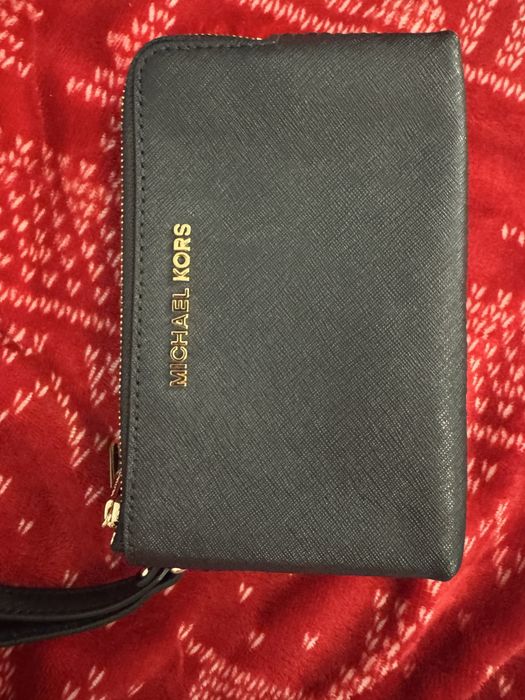 Portfel Michael Korse