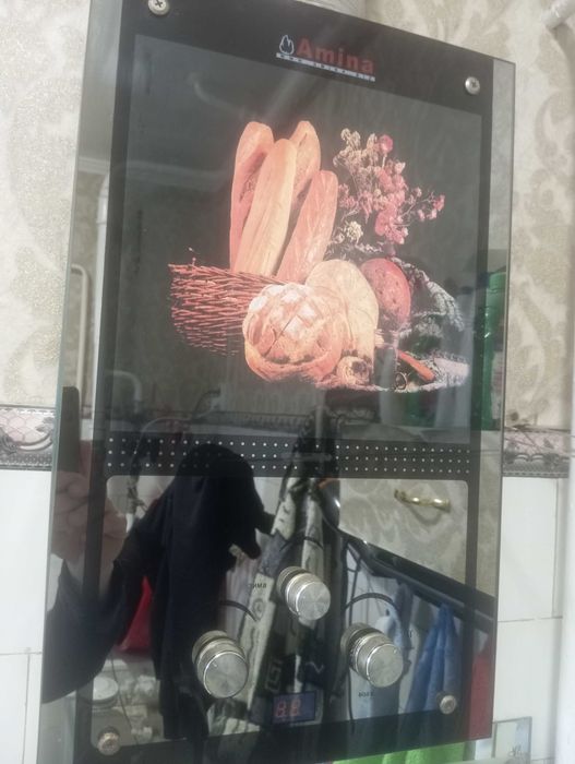 Газова колонка Amina