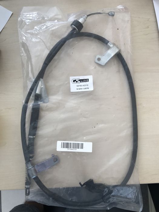 Трос ручника задний левый  59760А2310 Киа сид , Хюндай і30 от 2013года