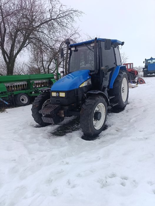 Трактор нью холанд