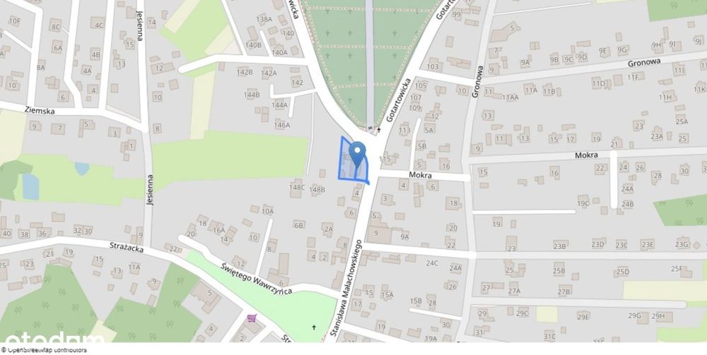 Działka z domem przy głównej drodze
