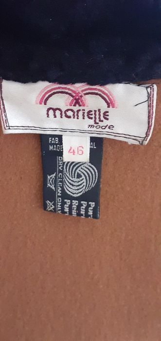 Capa de lã com pele
