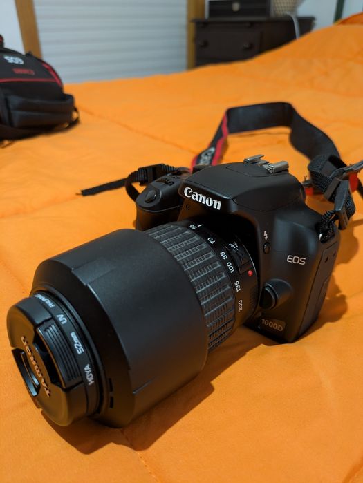Máquina fotográfica canon D1000