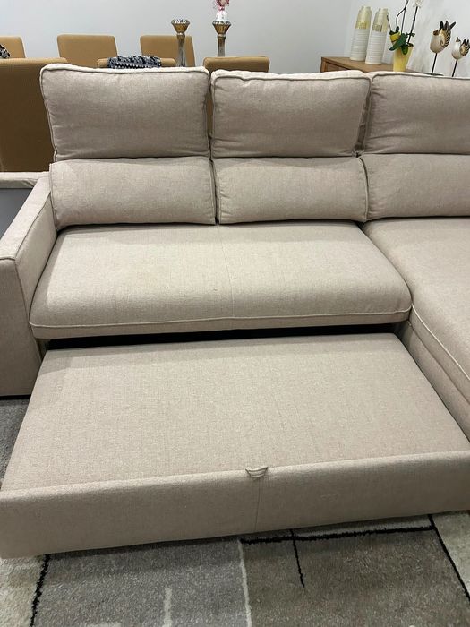Sofá com chaise long e cama
