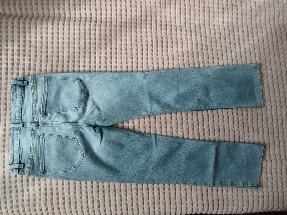 Spodnie jeansowe firmy Sinsay r.34