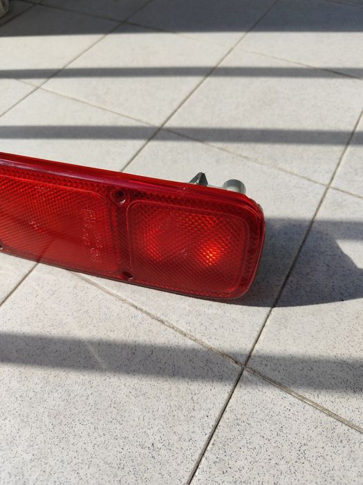 SEMINOVO- FAROLIM esquerdo Terrano ou Maverick - FAROL