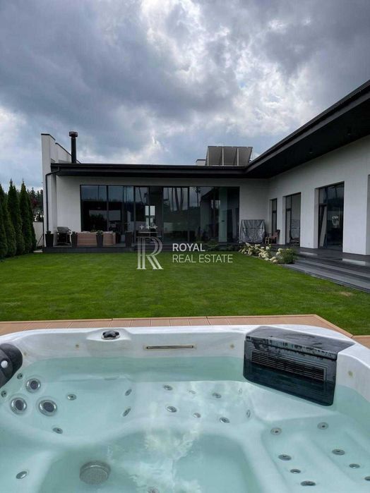 Продаж Будинок Бучанський район КМ «Белгравія» 280 м² 3 спальні Басейн Тераса 100 м² Сауна Джакузі Розумний дім Гараж