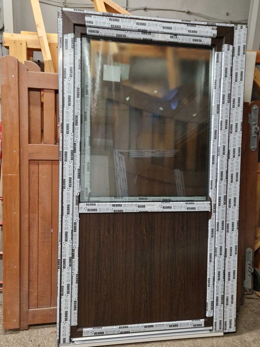 Drzwi balkonowe PVC 130 - 1290x2200 nowe - dąb bagienny (lewe i prawe)