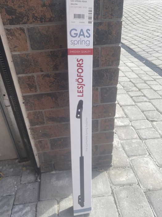 Амартізатор кришки багажника Mazda CX7