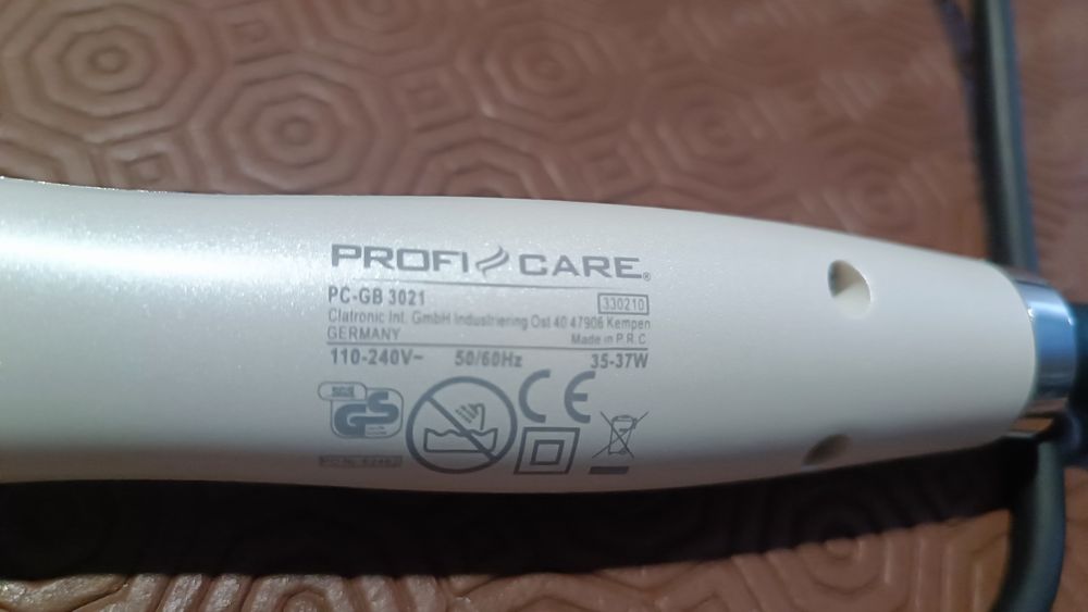 Escova de cabelo elétrico