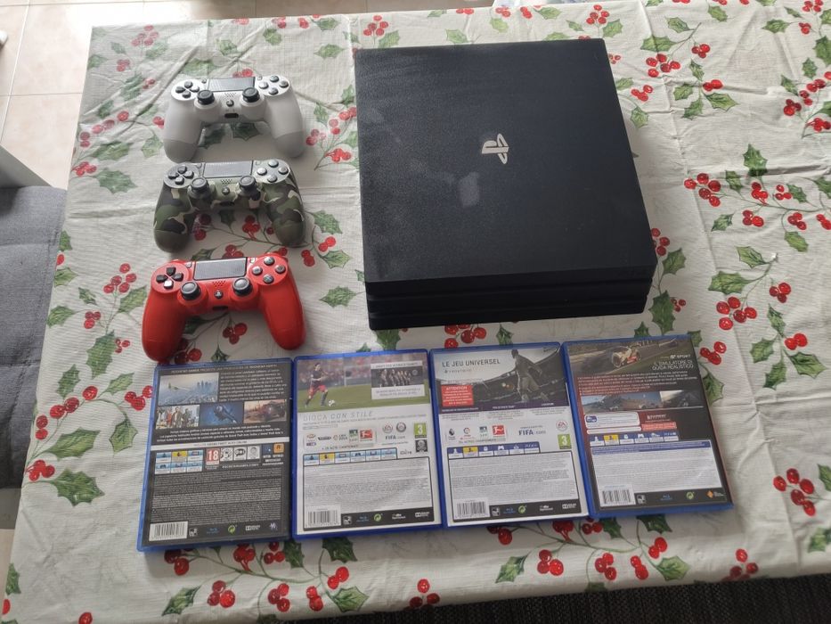 PlayStation 4 Pro 1TB + 4 Jogos + Comando + Cabos