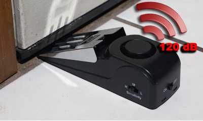 Travão de porta com alarme