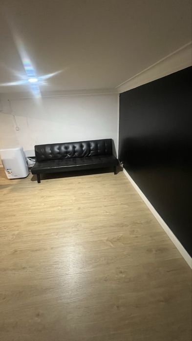 Estudio situado em barbearia segundo andar
